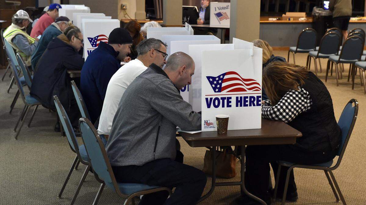 These Kansas City voters were out early Tuesday morning and still had a lengthy wait at the Country Club Christian Church on Ward Parkway.