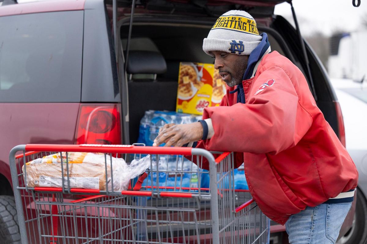 Jesse Stills of Kansas City loaded essentials into his car after stocking up at Costco on Saturday, Jan. 4, 2024, in midtown Kansas City. The winter storm forecast is driving people to stock up on essentials and other supplies. The storm is expected to bring heavy snow, rain, ice and wind to the to the area.