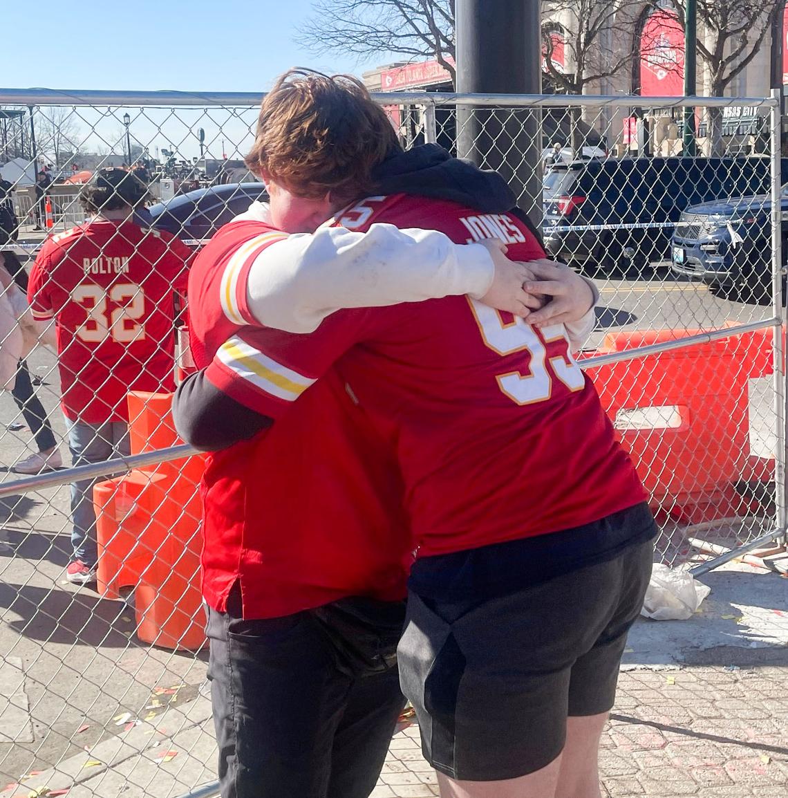 Hank Hunter, left, and Gabe Wallace embraced after reuniting following the shooting at the Kansas City Chiefs Super Bowl parade.