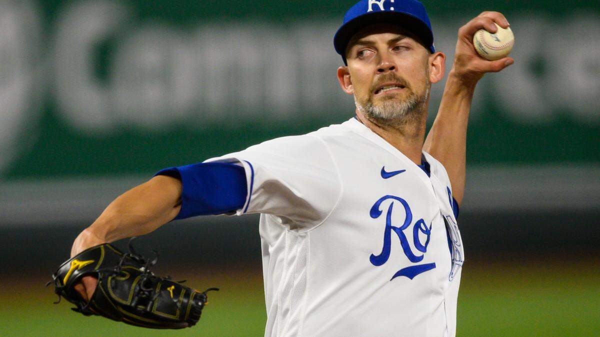 Kansas City Royals starting pitcher Mike Minor throws against the Cleveland Indians during the fifth inning of a baseball game Tuesday, May 4, 2021, in Kansas City, Mo.