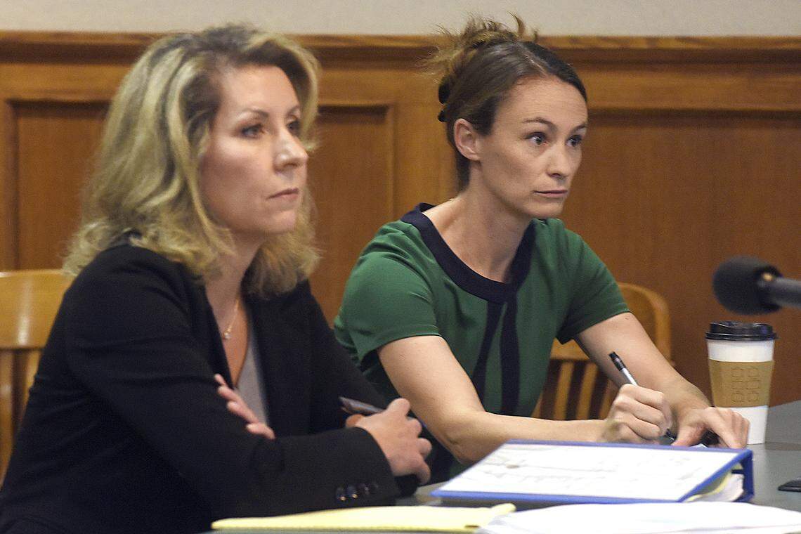 Sheena Greitens, right, the ex-wife of Missouri Republican U.S. Senate candidate Eric Greitens, and her attorney Helen Wade listen during a July 15 hearing in a child custody case in Columbia.