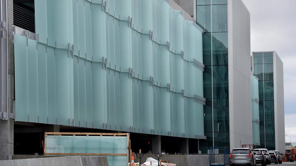 Installation of glass panels on the parking garage is mostly complete and work continues on the terminal building. The Kansas City Aviation Department gave a tour of the new single terminal building of Kansas City International Airport to show its progress Thursday, March 24, 2022.