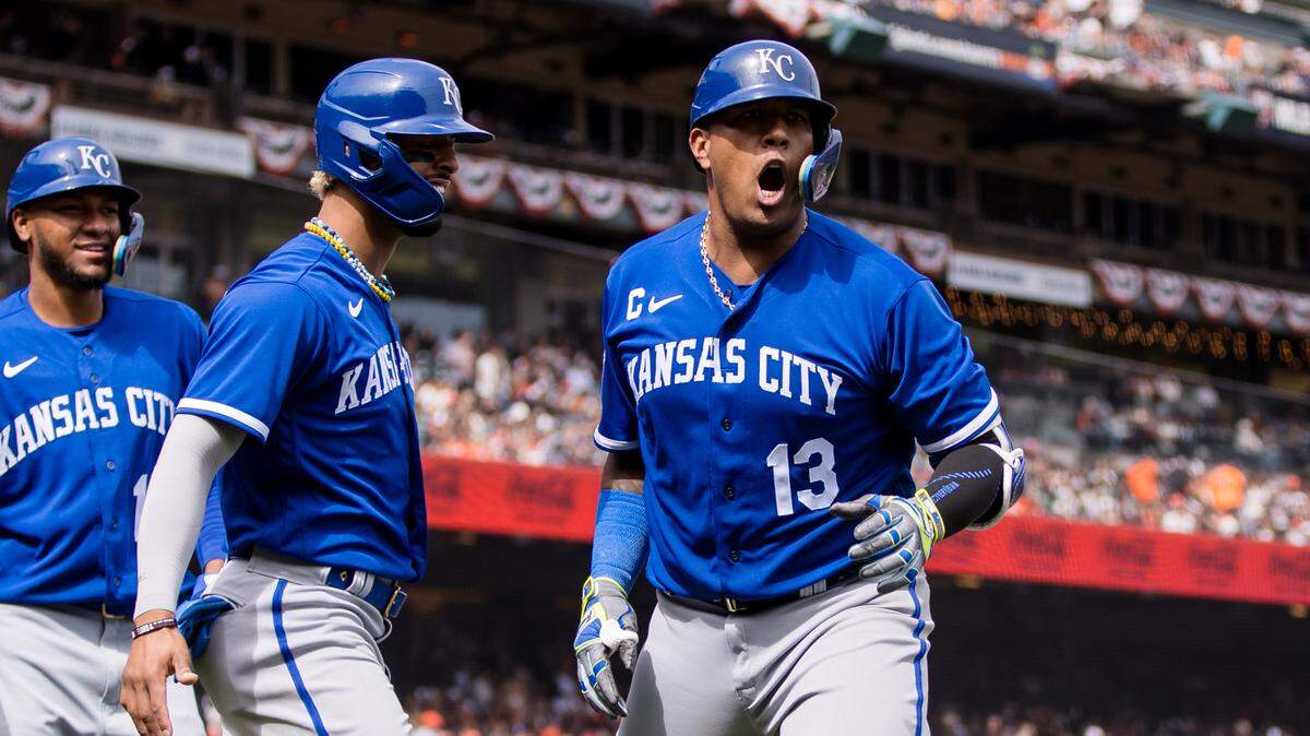 Kansas City Royals catcher Salvador Perez (13) is congratulated by right fielder MJ Melendez (1) after hitting a three-run home run against the San Francisco Giants at Oracle Park on April 8, 2023.