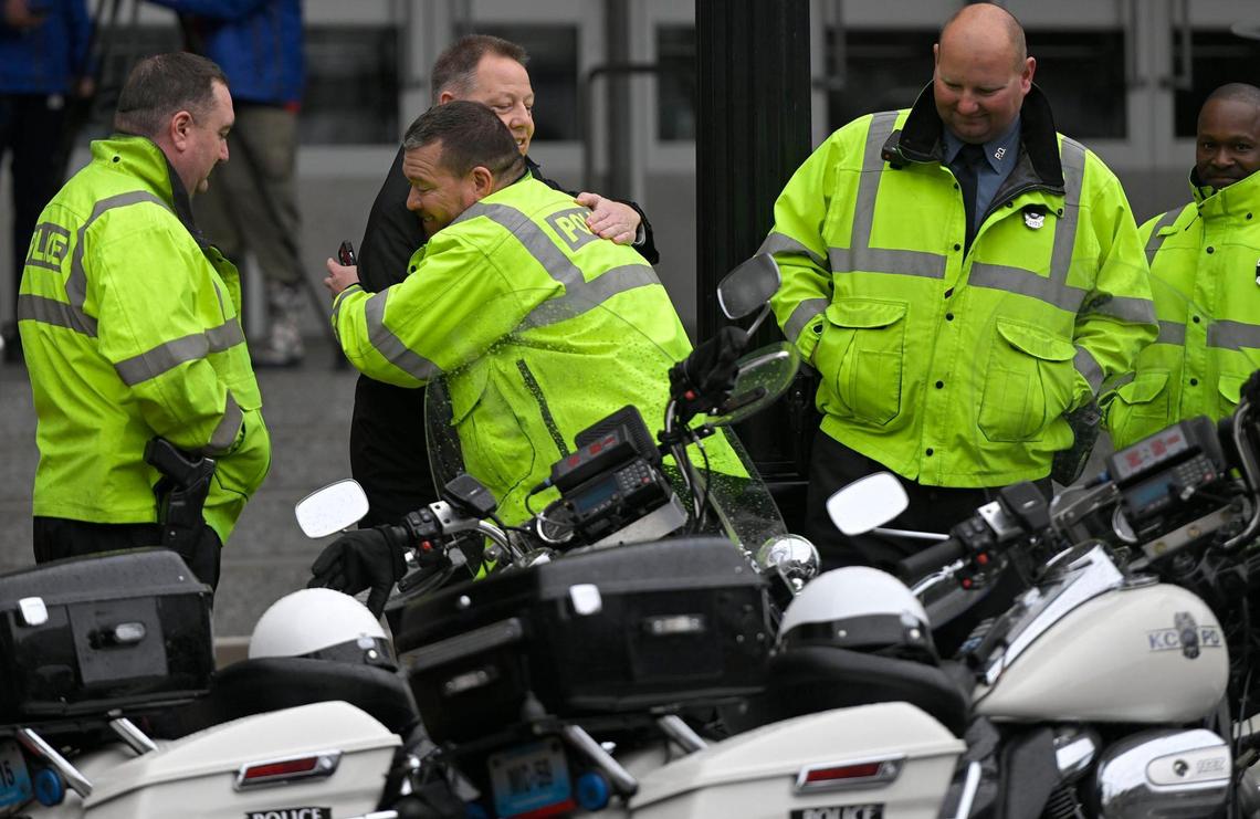 Rick Smith, former Kansas City Police Chief, greeted officers before the funeral for fallen Police Officer James Muhlbauer, 42, and his police K-9, Champ, during a visitation Wednesday, Feb. 22, 2023, at Municipal Auditorium in Kansas City. The officer and K9 were hit and killed when a driver, traveling at a high rate of speed, allegedly ran a red light at Benton Boulevard and E. Truman Road and plowed into the officer’s patrol car on Wednesday, Feb. 15, 2023.