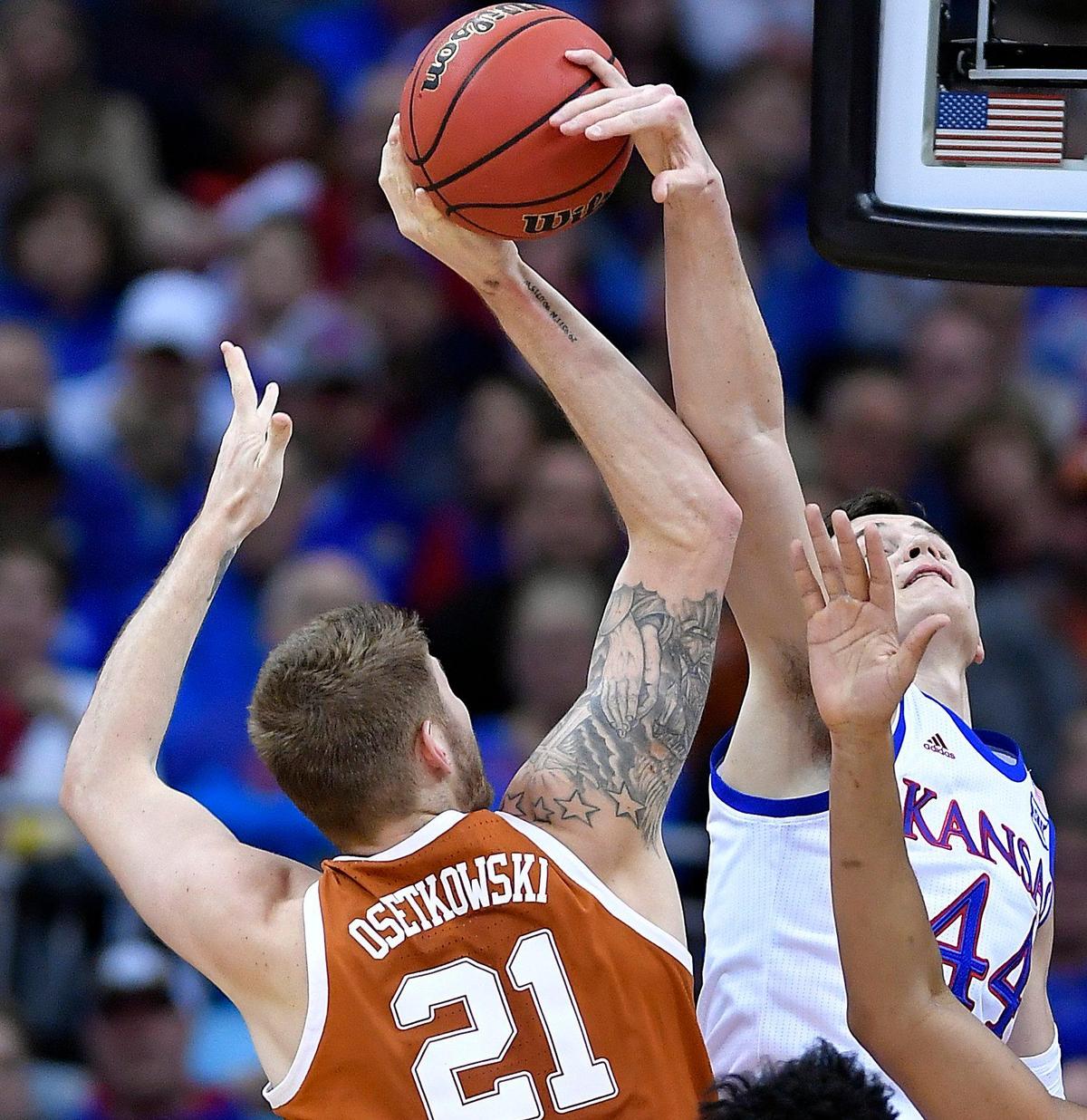KU forward Mitch Lightfoot and the Jayhawks renew acquaintances with the Texas Longhorns on Monday.