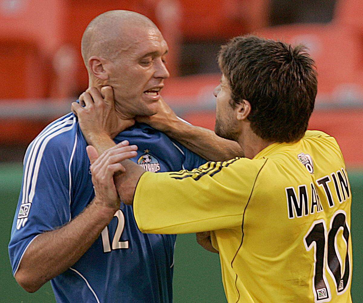 Then-KC Wizards defender Jimmy Conrad (left) got into it with Columbus Crew midfielder Kyle Martino during an MLS match in 2005 at Arrowhead Stadium in Kansas City.