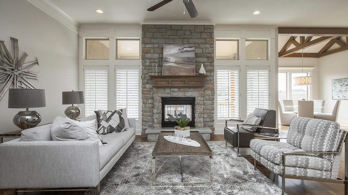 Upon entering this beautiful Crestwood built by Taylor Sterling Distinctive Homes, located at 2405 W. 146th St., the buyer is greeted by a floor-to-ceiling stone fireplace encompassed by soaring windows.