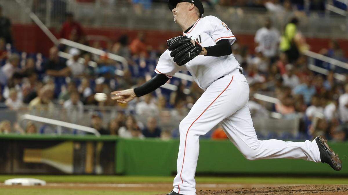 Miami Marlins’ Brad Ziegler delivers a pitch during the sixth inning of a baseball game against the Washington Nationals, Thursday, July 26, 2018, in Miami. (AP Photo/Wilfredo Lee)