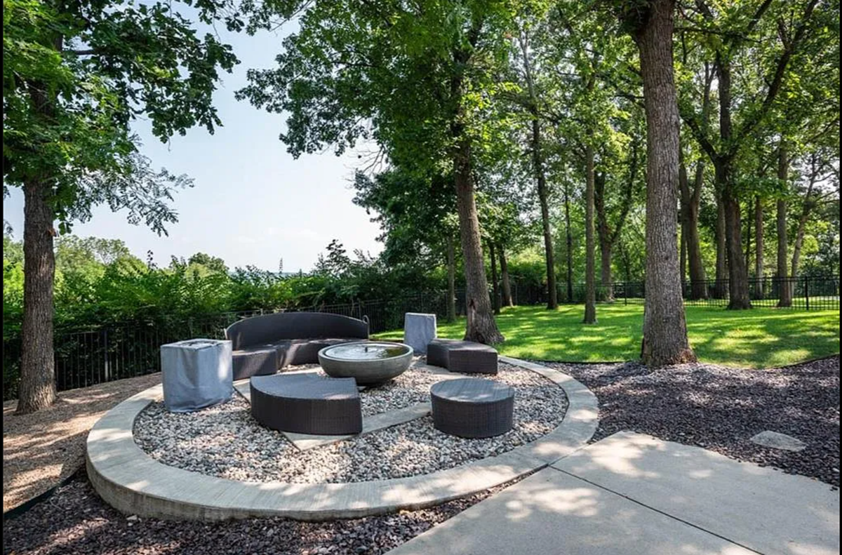 The one-acre home at 2840 W 111th Terrace in Leawood features a spacious backyard.