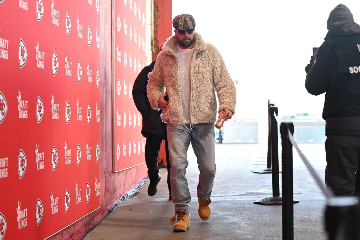 Travis Kelce kept warm in faux fur.
