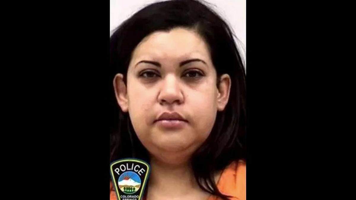 Jacqueline Souza, 31, was angry that her fiance wanted to invite his old girlfriend to their wedding because she suspected them of still having an affair, say Colorado Springs police. She is accused of stabbing him to death.