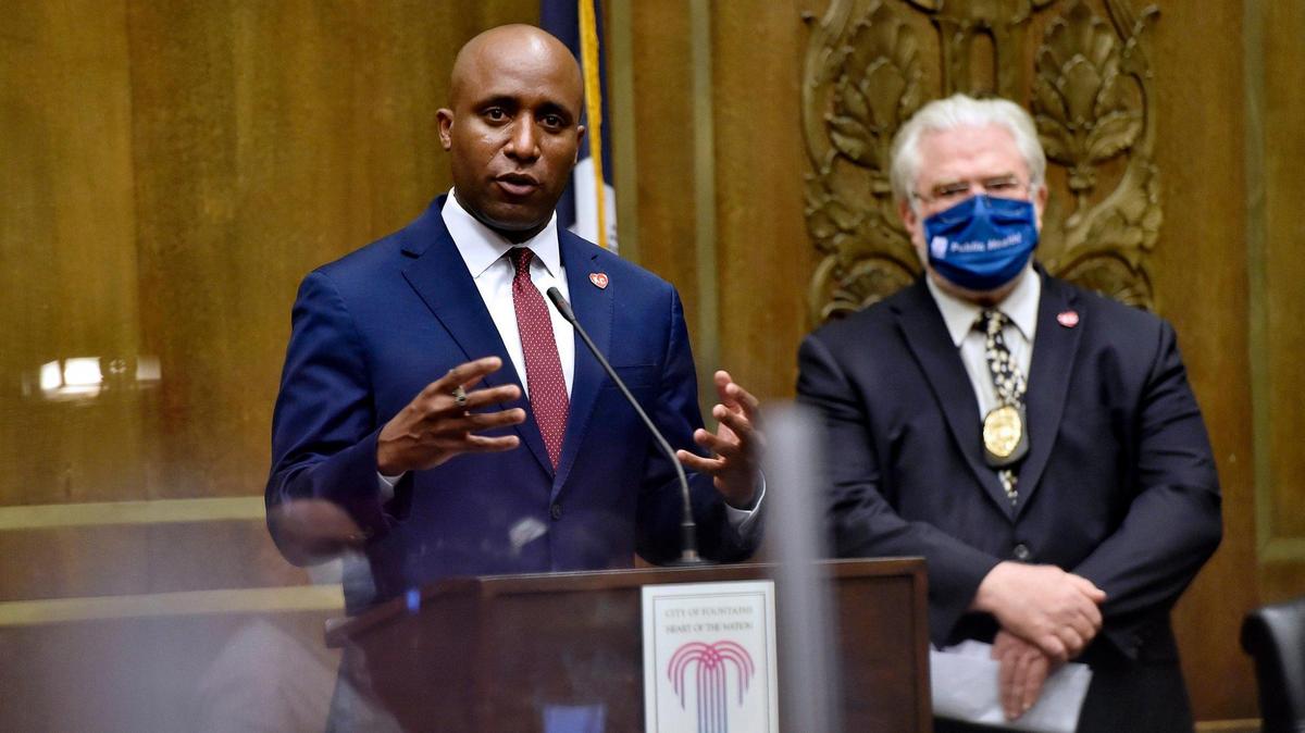 Mayor Quinton Lucas, left, and Health Department Director Rex Archer on Tuesday, July 21, 2020, inside city council chambers.