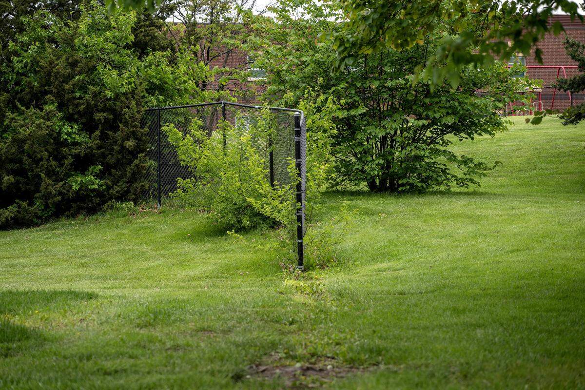 Part of a fence line that once enclosed the Bluejacket Pool remains at Bluejacket Park on Friday, May 8, 2026, in Overland Park.
