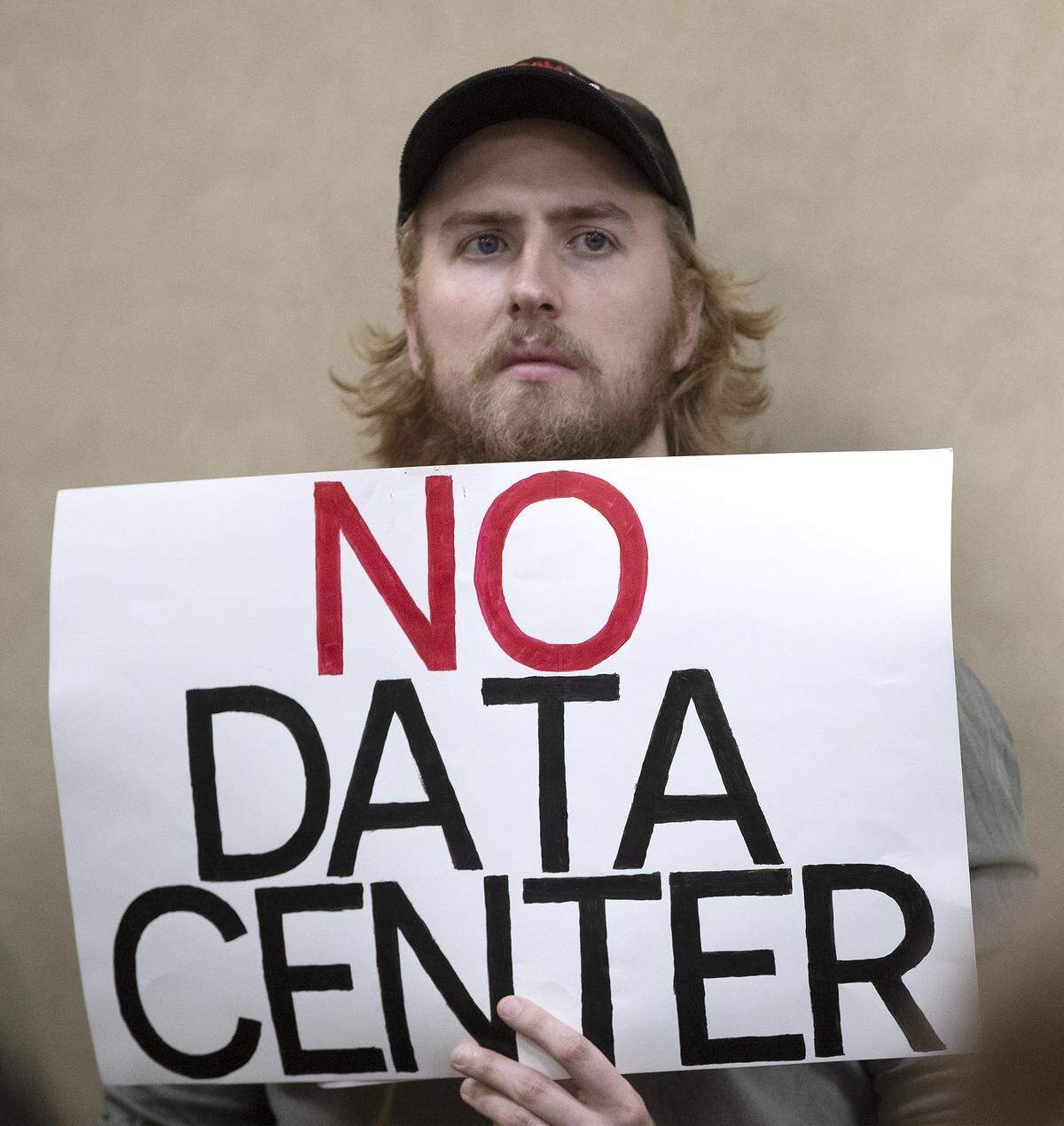 It was standing room only and No Data signs were prevalent Monday, March 2, 2026, as the Independence City Council prepared to vote on a tax incentive plan for the Nebius AI data center.