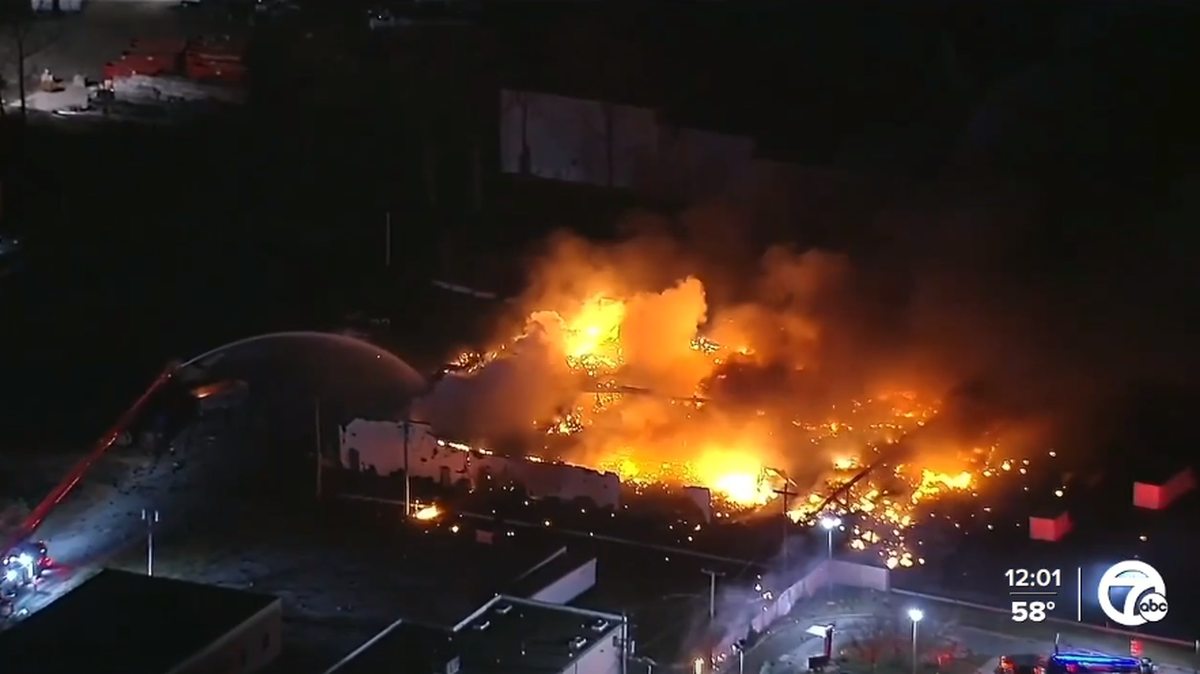 Flying debris from a burning, exploding vape supply building hit and killed a man in Clinton Township, Michigan, officials say.
