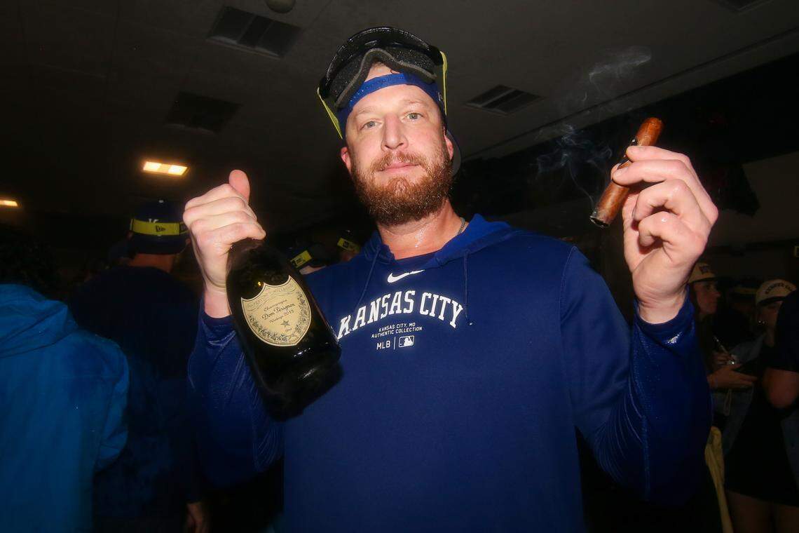 Kansas City Royals relief pitcher Will Smith (31) celebrates after clinching a wild card playoff birth after a game against the Atlanta Braves at Truist Park.
