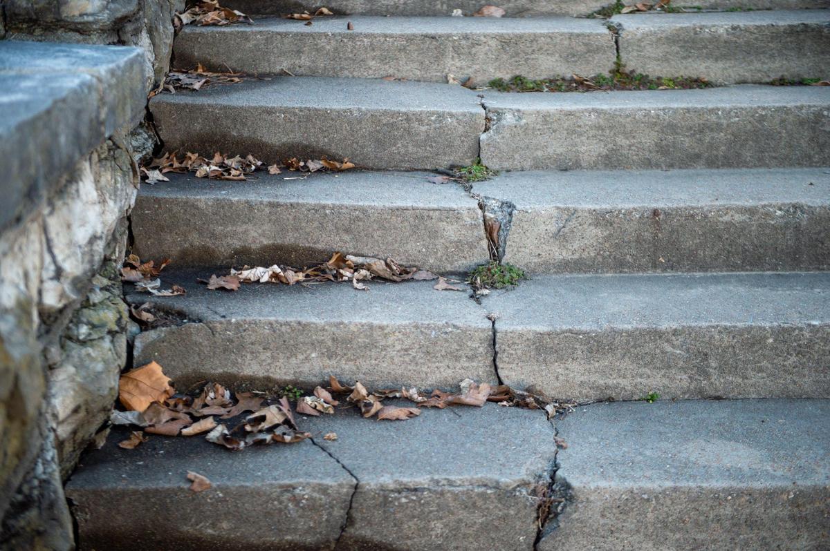 The stairs to get into the Boston Daniels Park on Quindaro Boulevard were all cracked. The park was dedicated to Boston Daniels, the first Black police chief of Kansas City, Kansas, in 1996.