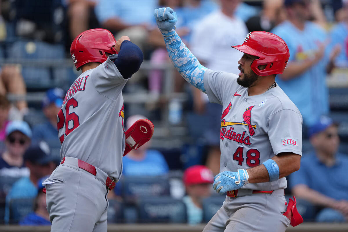 St. Louis Cardianals designated hitter Iván Herrera celebrates his three-run home run with JJ Wetherholt in the fifth inning against the Kansas City Royals at Kauffman Stadium on June 21, 2026 in Kansas City, Missouri.