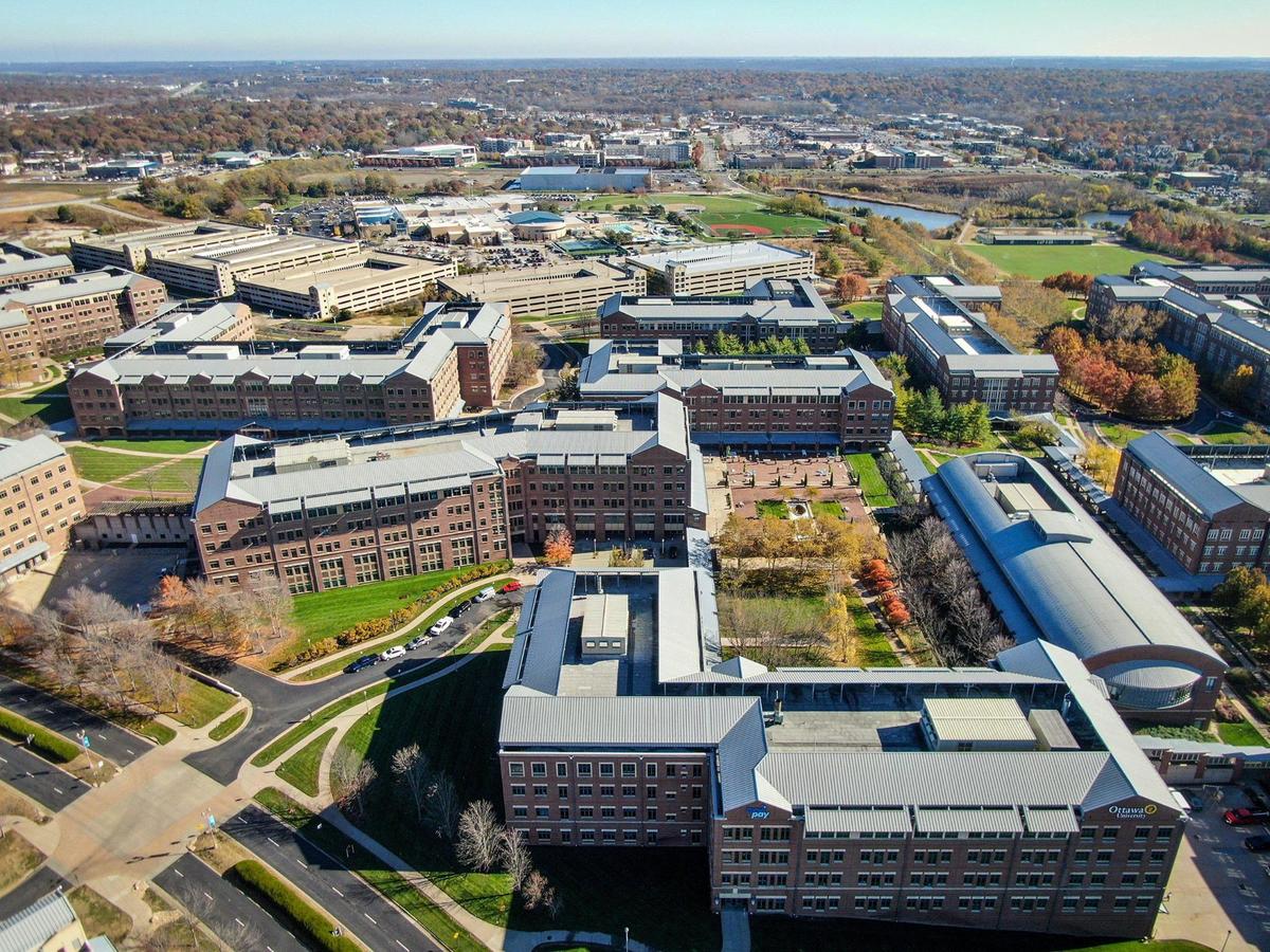 The Aspiria campus includes several five-story parking garages.