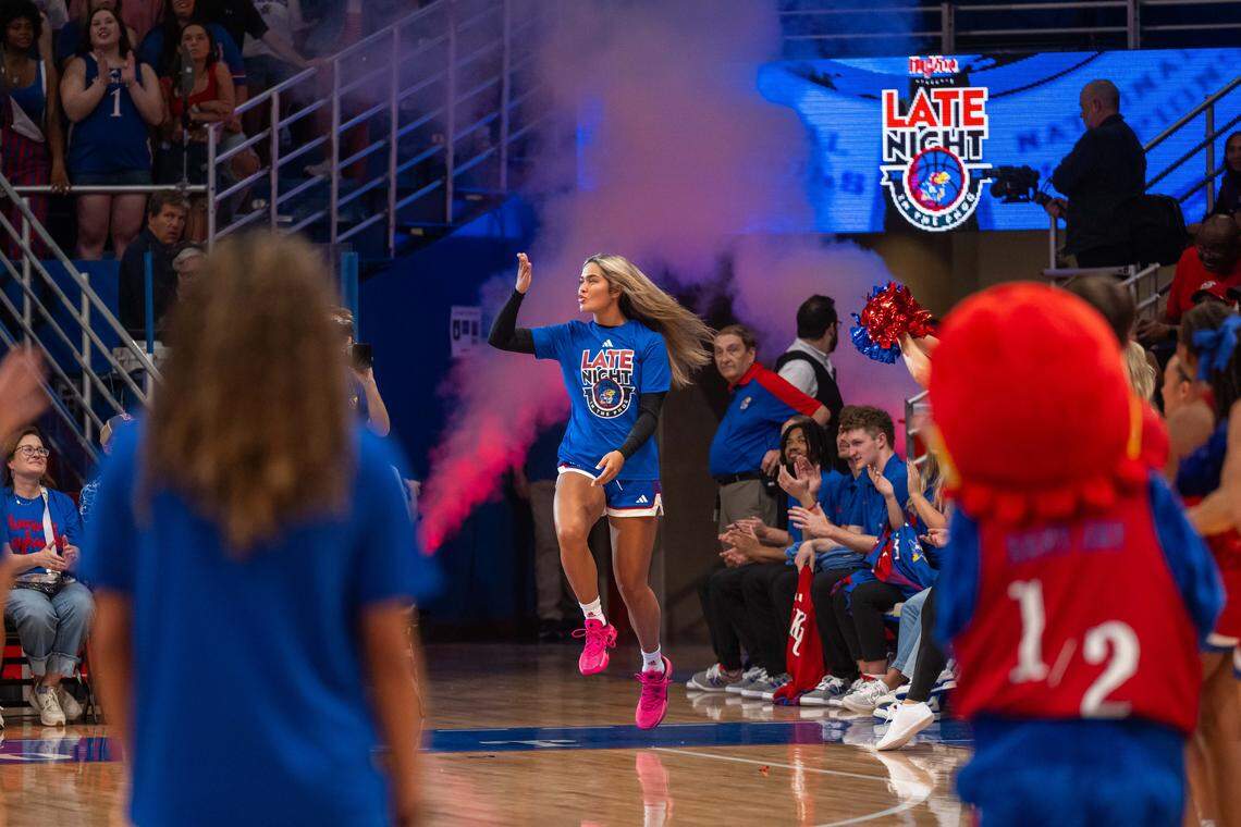 Kansas Jayhawks forward Regan Williams blows a kiss to the crowd prior to the women's team scrimmage at Late Night in the Phog, on Friday, October 17, 2025, in Lawrence.