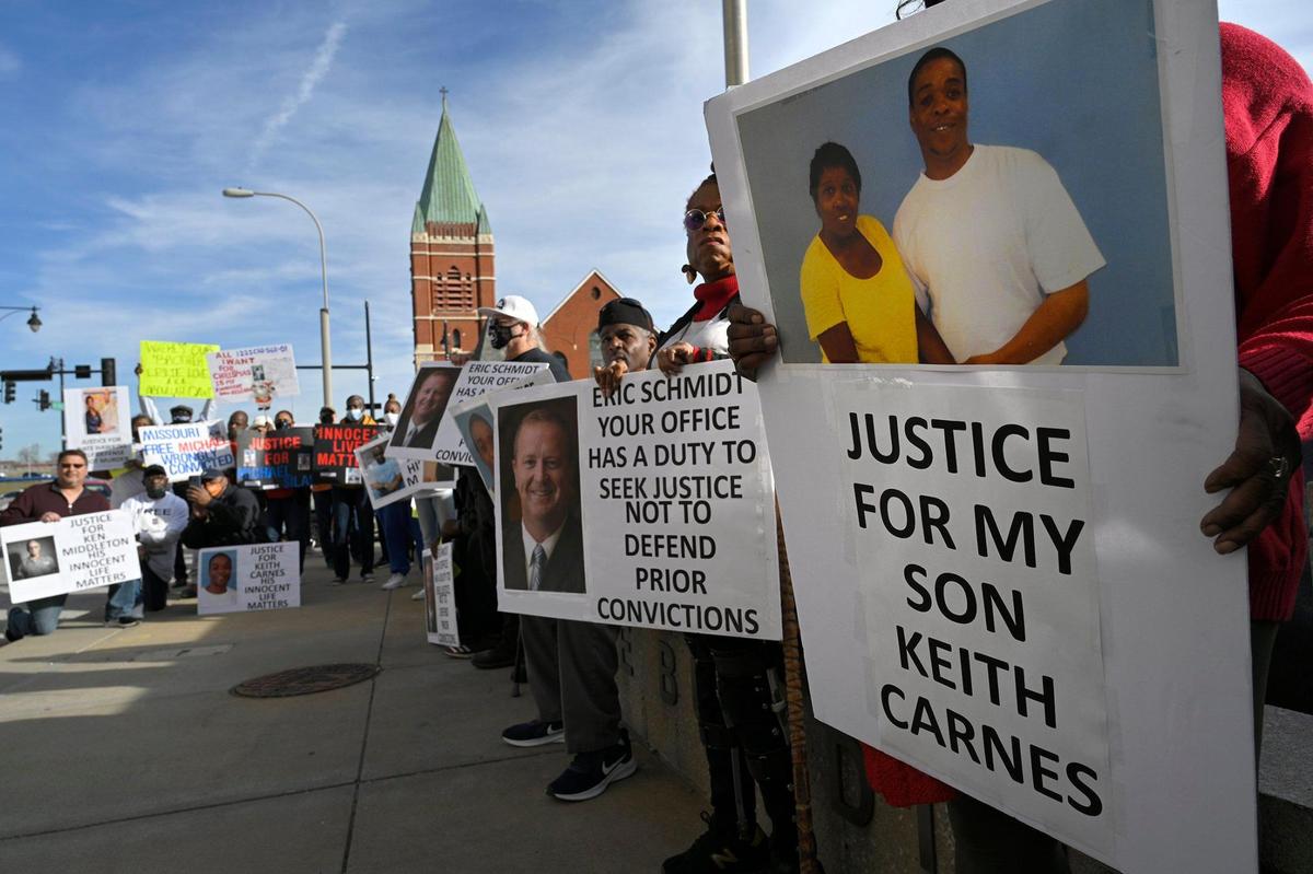 Supporters of people they say are wrongfully convicted held an “Innocence is enough” rally at Missouri’s Fletcher Daniels State Office Building Monday in Kansas City. The rally, organized by KC Freedom Project, demanded that Missouri Attorney General Eric Schmitt stop fighting wrongful conviction cases when there is evidence of innocence.