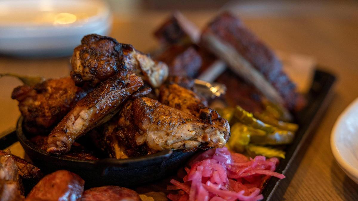 A variety of grilled meat sits on a table at Jack Stack Barbecue in Kansas City on Friday, Jan. 28, 2022.