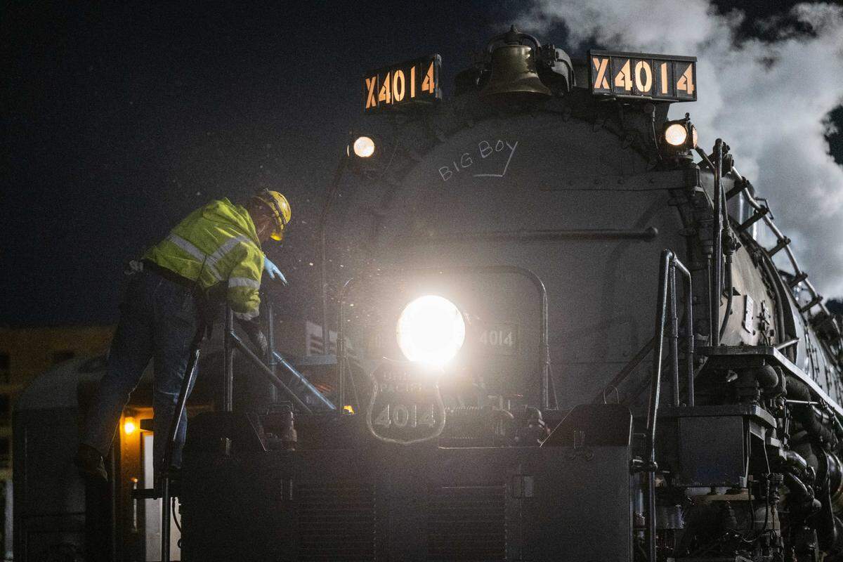 A train technician performs maintenance on Union Pacific’s Big Boy in Kansas City on Tuesday, Oct. 15, 2024.