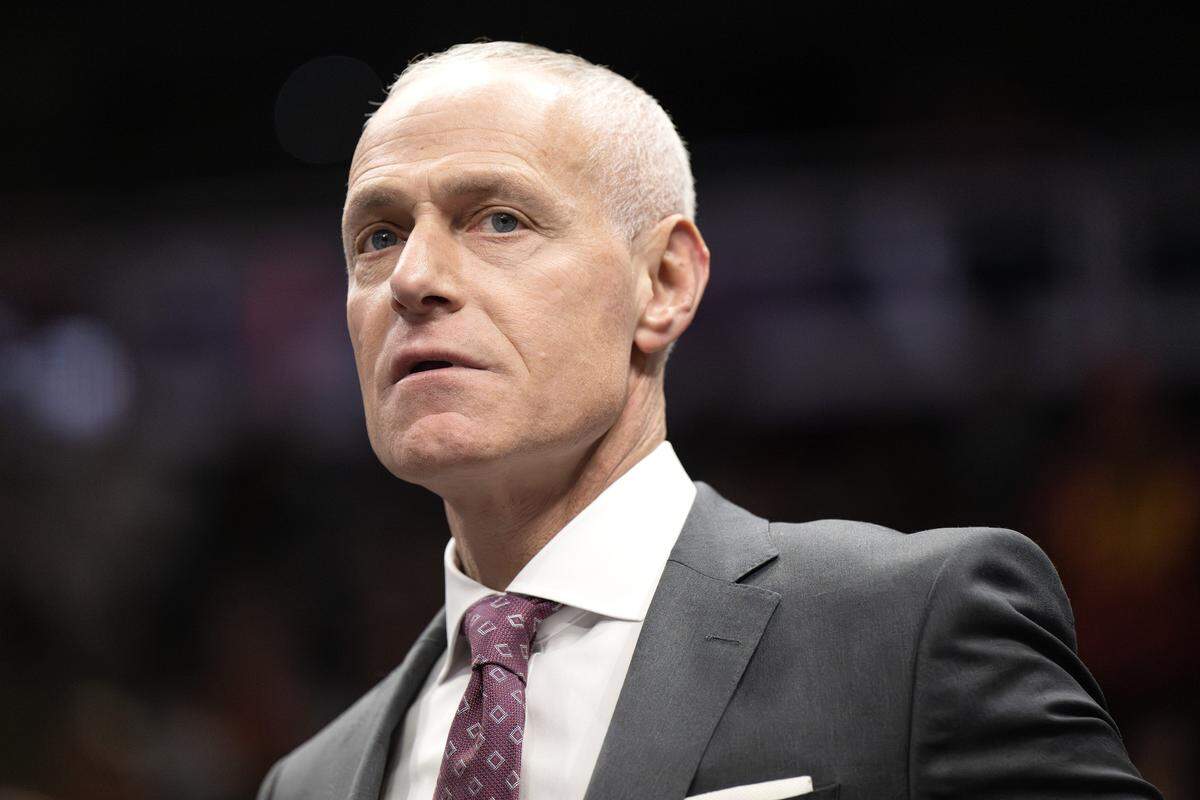 Brett Yormark, commissioner of the Big 12 Conference, stands court side while watching a game between the Cincinnati Bearcats and the UCF Knights during the first half of a Big 12 Men's Basketball Tournament at T-Mobile Center on Wednesday, March 11, 2026, in Kansas City.