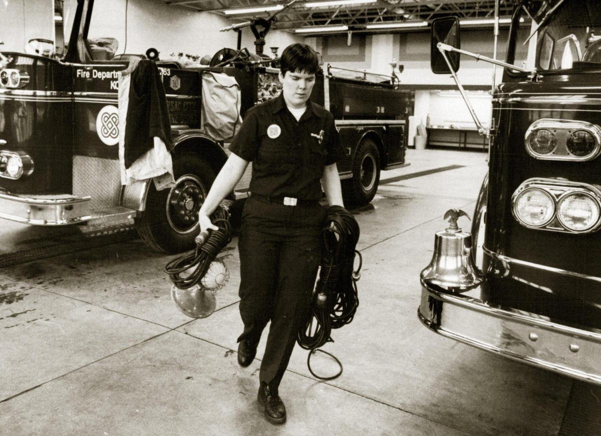 Kansas City firefighter Anne Wedow on the job in 1977, when she was one of the first female firefighters hired by the department. She said the discrimination she suffered worsened after she and another woman sued the department.