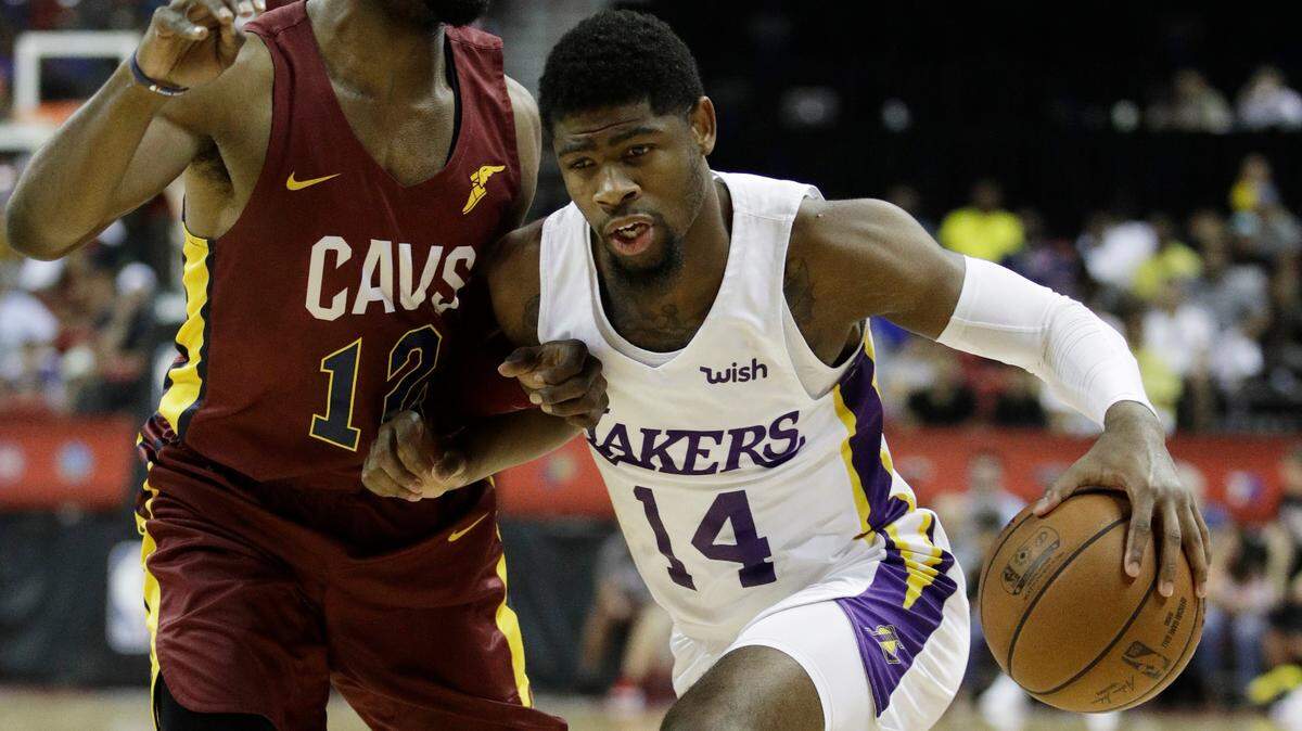 Malik Newman (right) has been waived by the Los Angeles Lakers. Newman had played with the Lakers this month in NBA summer-league games.