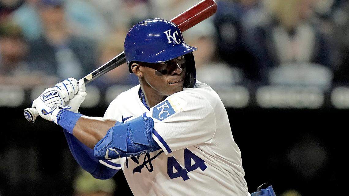 Kansas City Royals’ Dairon Blanco hits a single during the fifth inning of a baseball game Minnesota Twins Friday, May 20, 2022, in Kansas City, Mo. The hit was Blanco’s first major league hit. (AP Photo/Charlie Riedel)