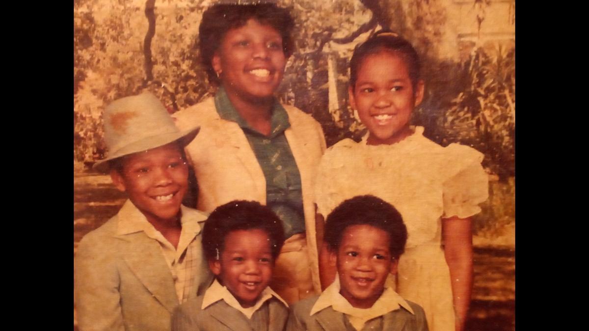 Chris Ingram is seen with his twin brother and older siblings in an undated family photo.