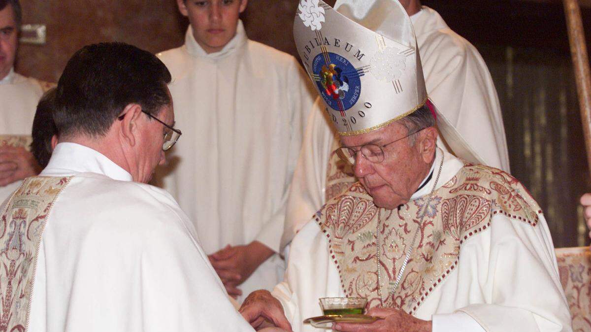 In a 2000 ceremony, newly ordained Rev. Robert Cook (left) was annointed by Bishop Joseph Hart during the Rite of Ordination in St. Marys Cathedral. Hart, a former bishop in the Roman Catholic Diocese of Cheyenne, Wyo., was twice accused of sexual misconduct with boys while he was a priest in Kansas City.