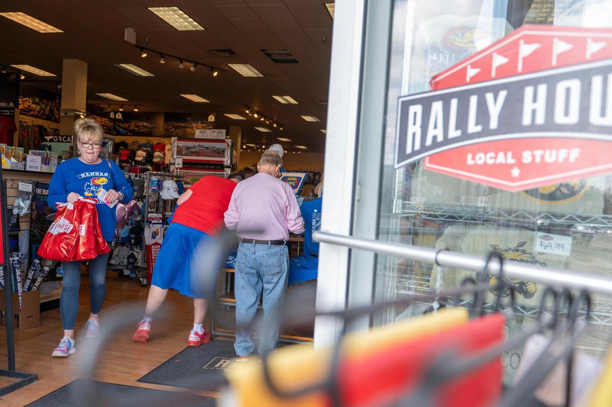 Kansas Jayhawks fans shop for KU basketball championship gear at Rally House in Lenexa on Tuesday, April 5, 2022.