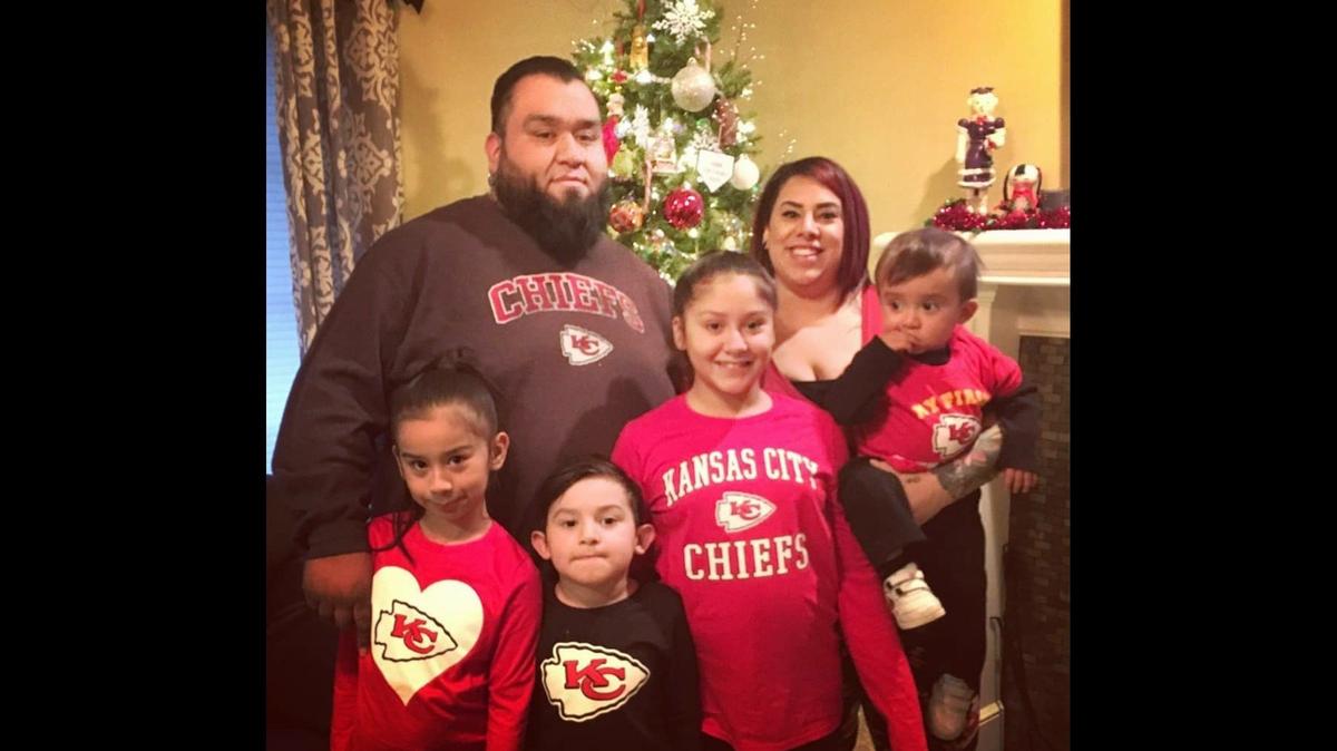 Joey and Crystal Marquez and four of their five children at an earlier Christmas. The family has since had another baby. Joey Marquez died of COVID-19 in October at age 39.