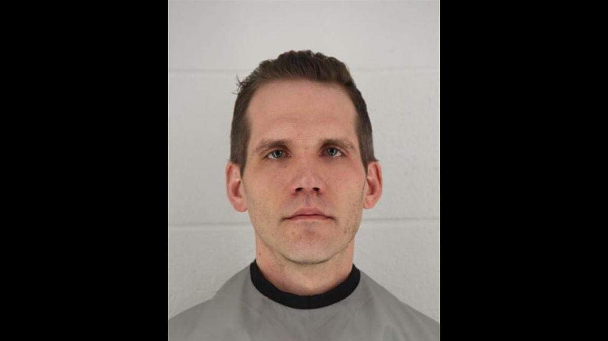 Phillip Michael Carney, 38, of Overland Park