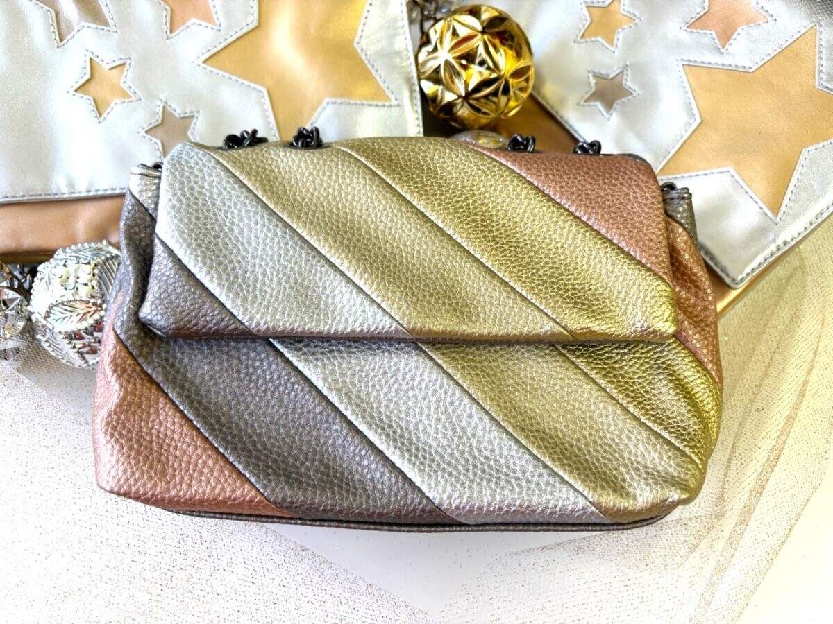This metallic faux-leather handbag is sold at Cheeky Bird in Parkville.