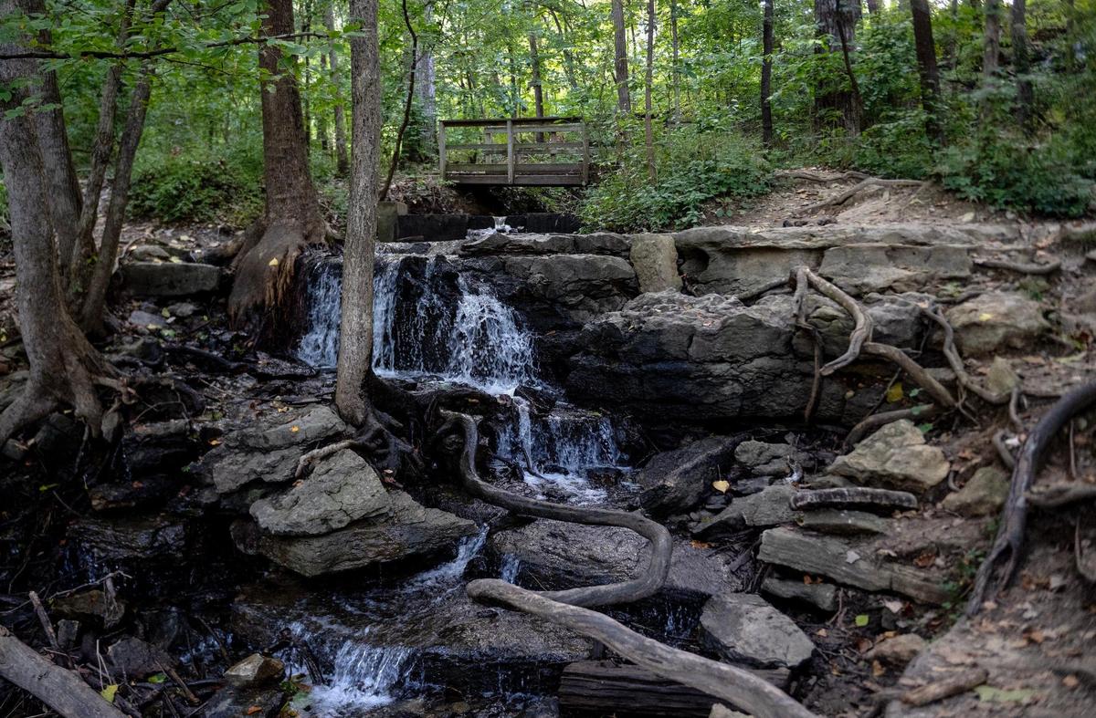 The Old Kate Trail at the Parkville Nature Sanctuary leads trail users past and over a waterfall in Parkville, Mo.