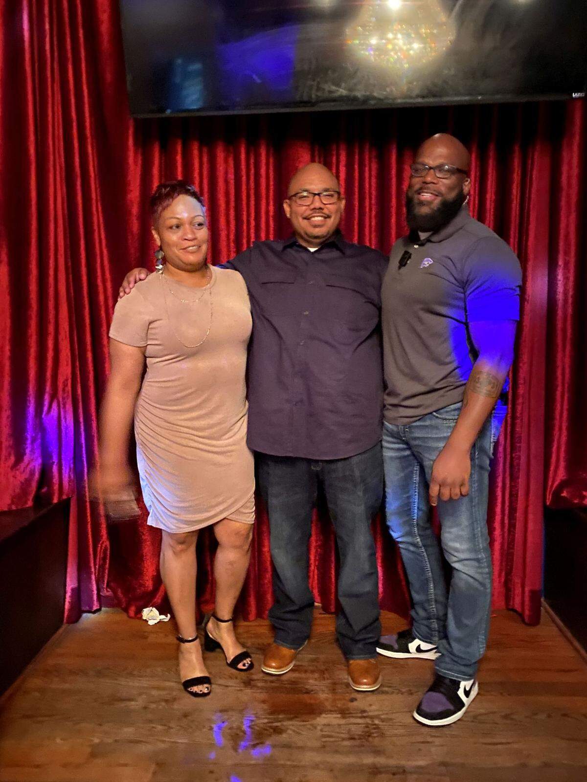 Kahlil Guinn, right, with siblings Rashanda Green and Tony Garcia.