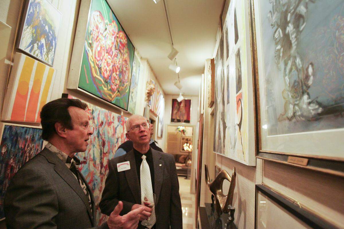 John “Topper” Johntz, left, shown here in 2012, offered filmmakers his vast collection of art and collectibles in his Prairie Village home. Many appeared in “Mr. and Mrs. Bridge.” But he did not.