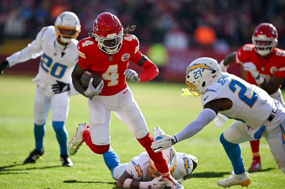 Kansas City Chiefs wide receiver Rashee Rice (4) runs after a catch against the LA Chargers at GEHA Field at Arrowhead Stadium on Sunday, Dec. 14, 2025.