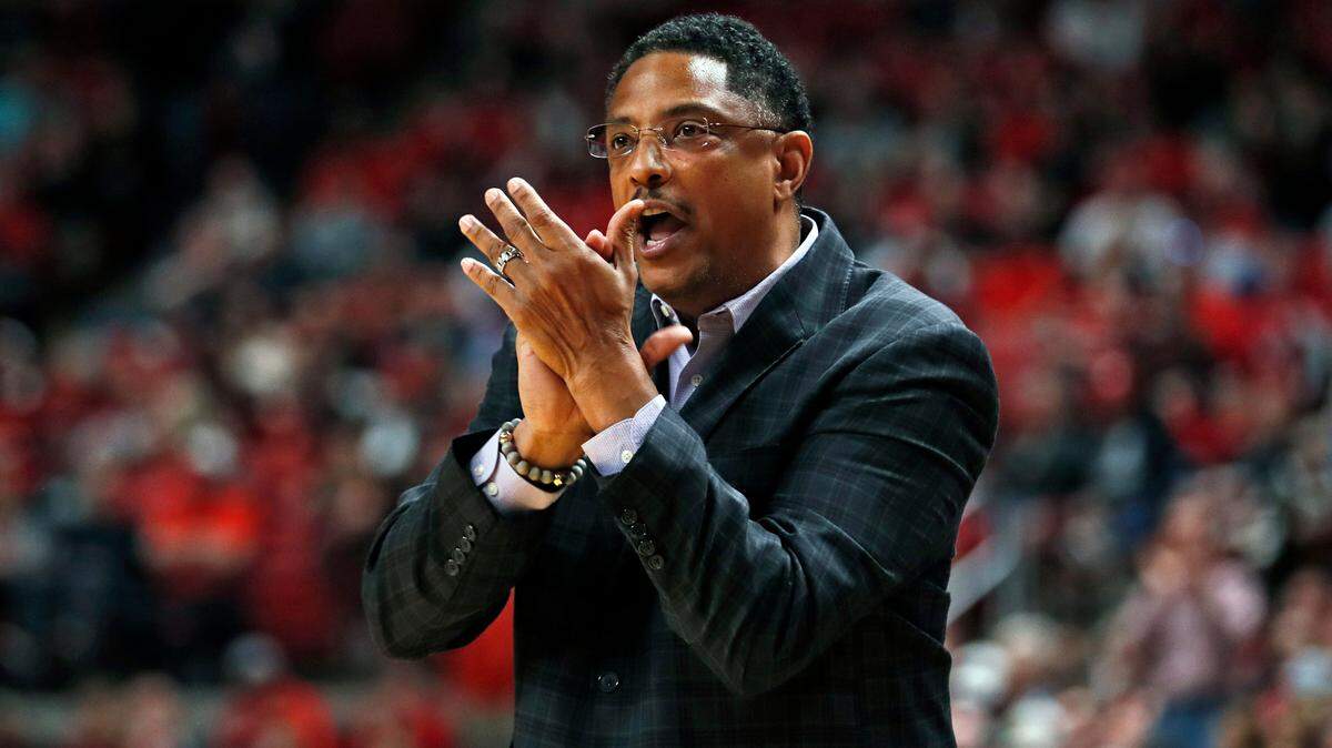 Texas-Rio Grande Valley coach Lew Hill claps after a play during the first half of an NCAA college basketball game against Texas Tech, in Lubbock, Texas. Texas Rio Grande Valley says Hill died Sunday, Feb. 7, 2021, a day after coaching a basketball game against Texas Southern. He was 55.