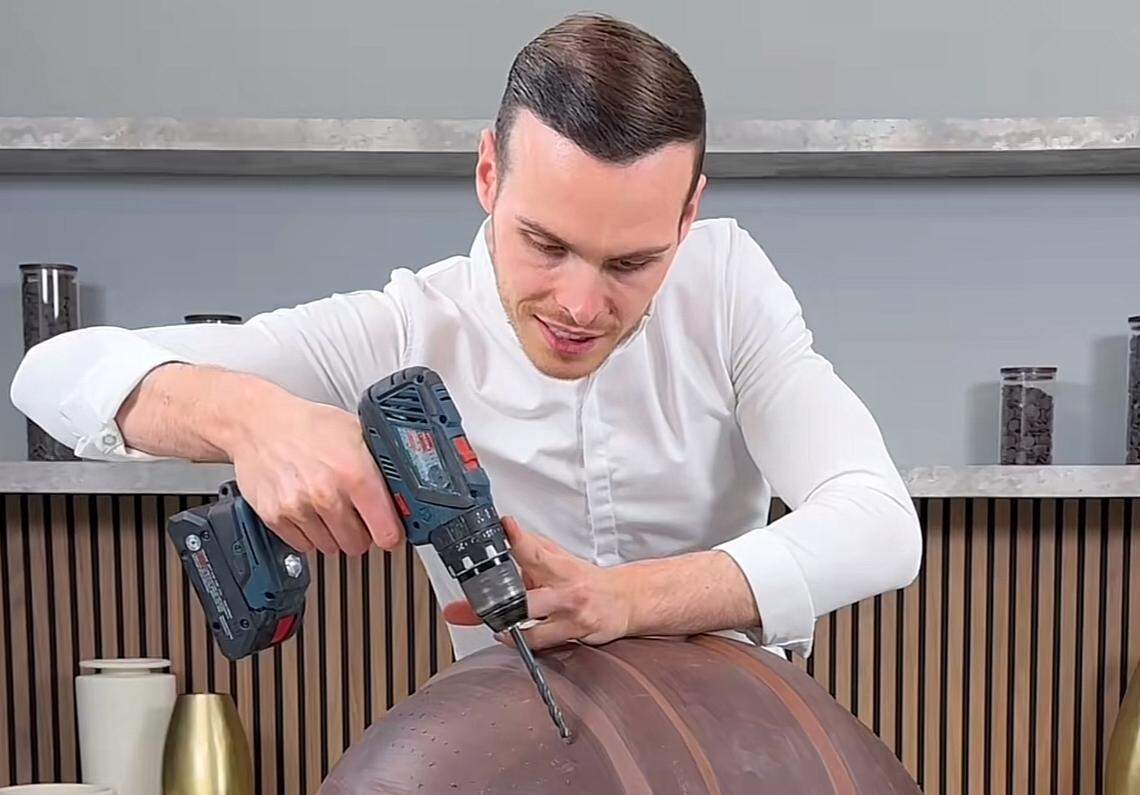 A video of French-Swiss pastry chef Amaury Guichon, known as “The Chocolate Guy,” making a giant Kansas City Chiefs helmet from chocolate has been seen more than 3 million times this week.