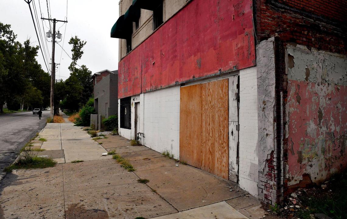 Two business storefronts two sit vacant at 35th Street and Prospect Avenue in Kansas City.