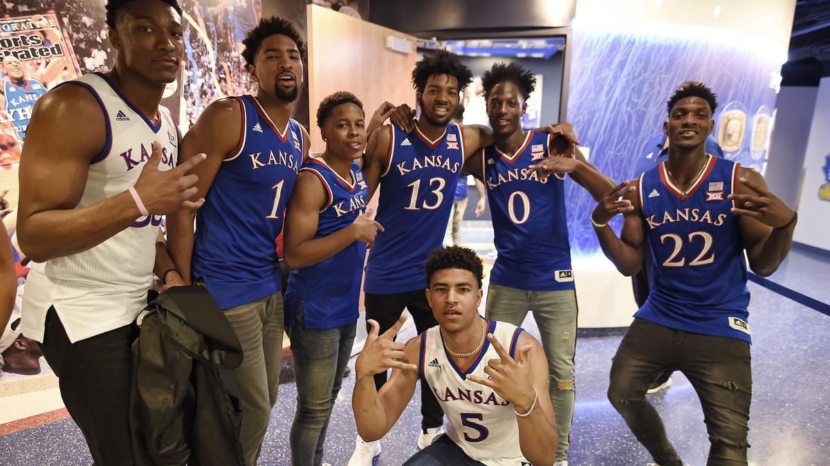 With dancing complete and a wardrobe change in order, several of the Jayhawks posed for a quick picture on their way back to their locker room during Friday’s Late Night in the Phog at Allen Fieldhouse.