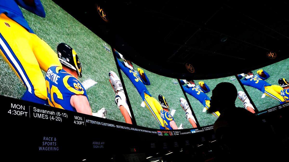 In this Feb. 3, 2019, file photo, a man watches Super Bowl LIII at the Westgate Superbook sports book in Las Vegas.