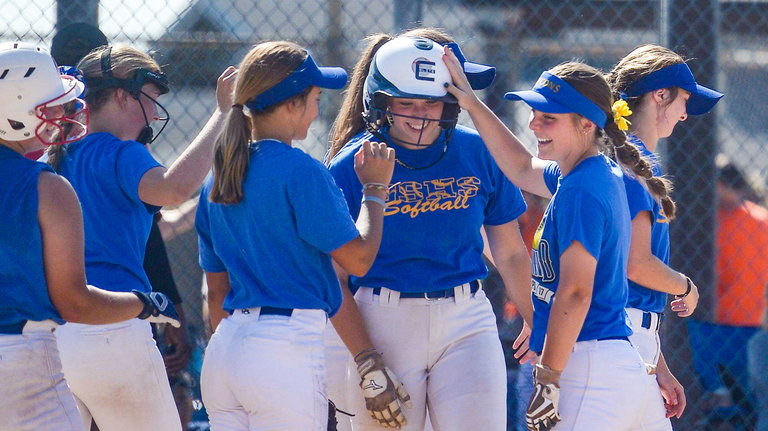 Softball teams from across Kansas played one last game Wednesday in Overland Park