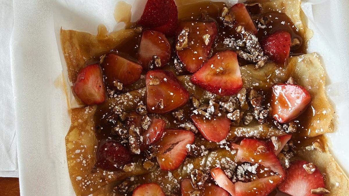 Flapjacks ‘N More, opening in Shawnee in September, serves tutti frutti crepes, covered in strawberries and pecans then drizzled in caramel.