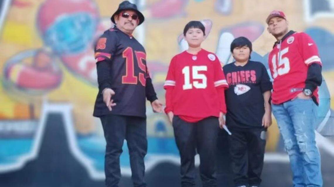 Samuel Arellano, 10, second from left, with his grandfather Victor Salas Sr., cousin Isaac Salas, 10, and uncle Victor Salas Jr., on the day of the Kansas City Chiefs Super Bowl victory celebration.