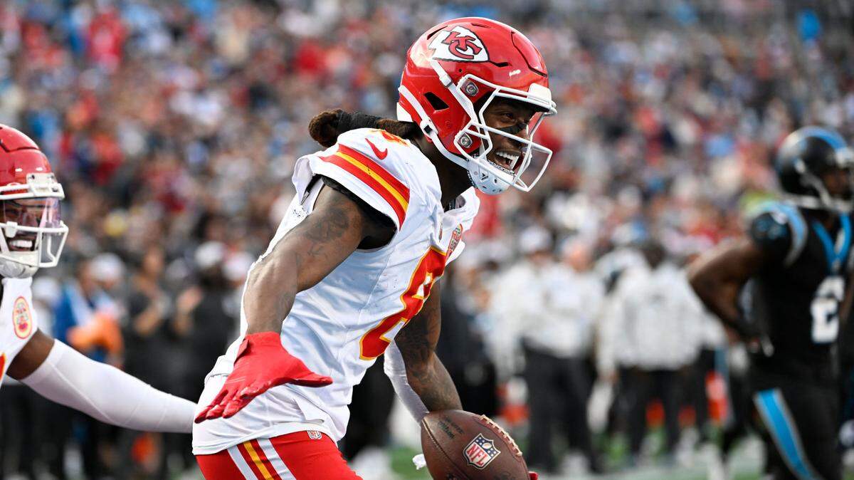Kansas City Chiefs wide receiver DeAndre Hopkins (8) reacts after catching a touchdown in the third quarter at Bank of America Stadium during the 2024 regular season.